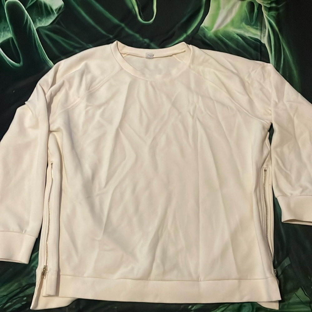 White long sleeve shirt with gold zipper on sides